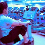 girl on exercise bike